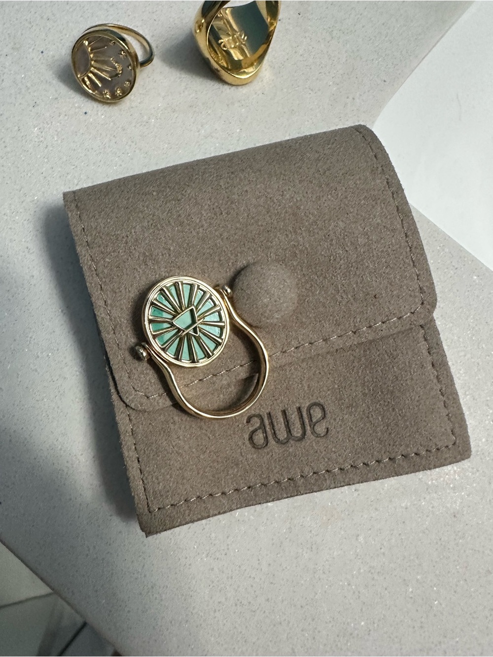 Awe inspired earth element Taurus Gold Toned Ring with Mint Green Enamel
